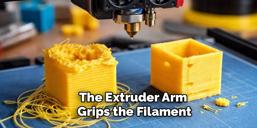 The Extruder Arm
 Grips the Filament